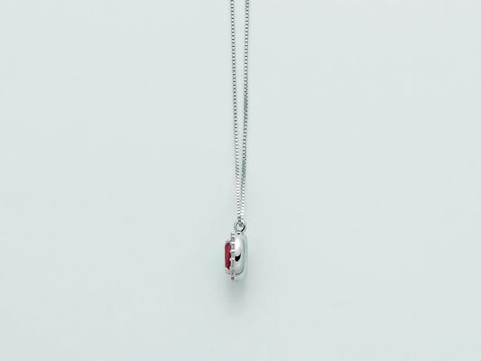 Miluna | Collana con Rubino Ovale e Contorno di Diamanti in Oro Bianco