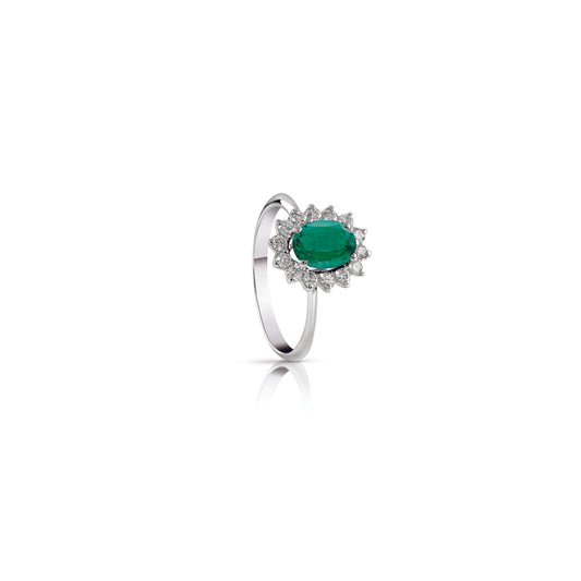 Anello con smeraldo centrale ovale e contorno di diamanti una griffe - Gioielleria Conte