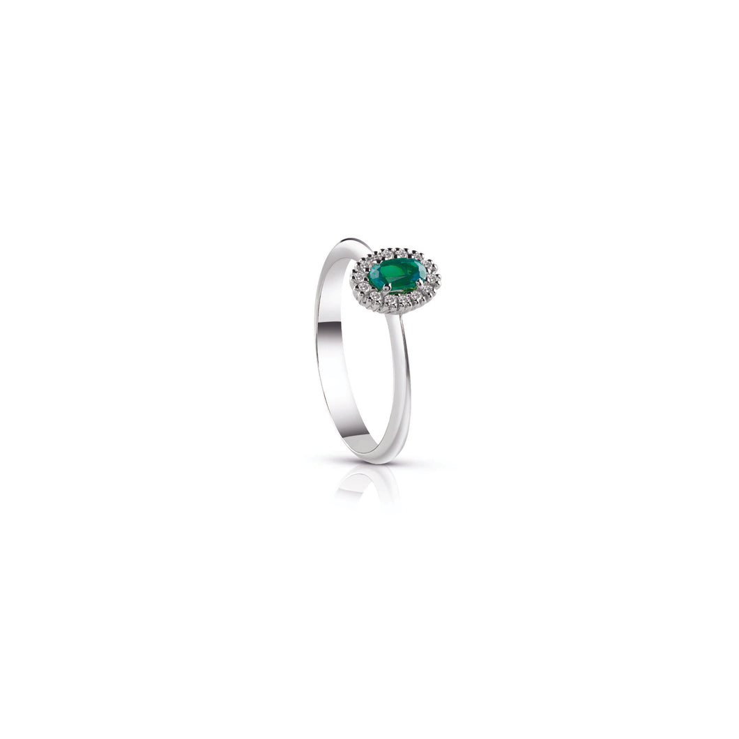 Anello con smeraldo centrale ovale e contorno di diamanti due griffe - Gioielleria Conte